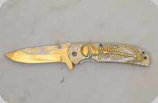 Couteau pliant Doré Squelette  lame de 10 cm  